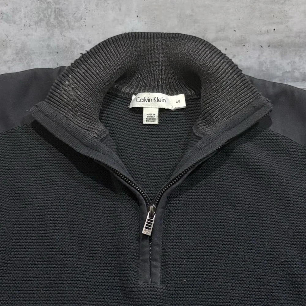 Vintage quarter zip sweater by Calvin Klein with faux suede shoulder patches